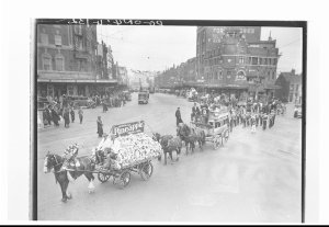 Horse-drawn float advertising Pineapple hams and bacon