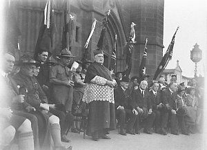 Archbishop Kelly conducting a service for Catholic scou...