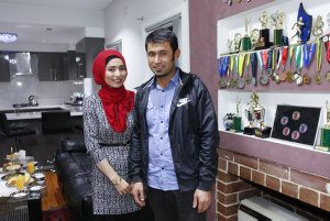 Item 091: Afghani Hazara brother and sister stand in fr...