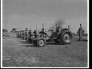 Entraining Chamberlain tractors at Lidcombe