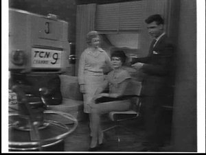 Mr. Ralph shows hair fashions on a TCN 9 television pro...