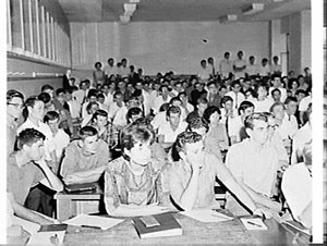 B. Farley speaks to students at the University of New S...