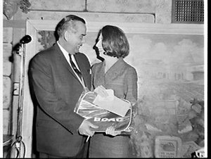 President (?) of the Taparoo Club present tickets for L...