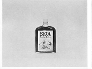 APA studio photograph of a bottle of Skol Suntan Lotion
