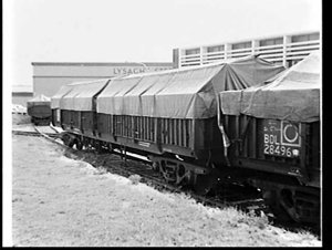 Tarpaulins on goods wagons at John Lysaghts' sidings, C...