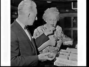 Ethel Brice samples food in the galley of the liner Ors...