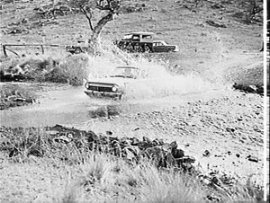 Fording a stream, 1964 Ampol Trial, Cooma