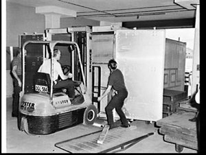 Fork-lifts unload OCL container at the Hoover factory l...