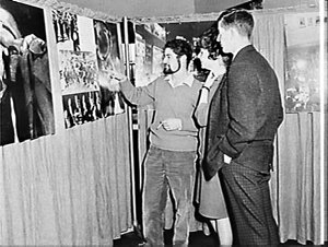 Students view a US Information photographic exhibition ...