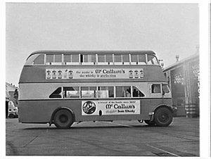 Leyland double-decker bus with McCallum's Whisky advert...