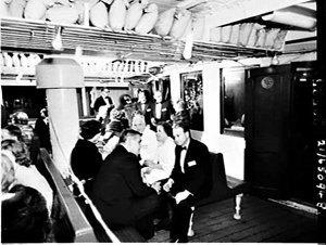 Party in evening dress on the Manly ferry South Steyne ...