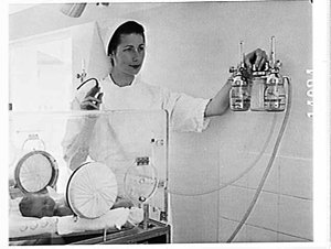 Nursing sister with baby in a humidicrib with CIG dual ...
