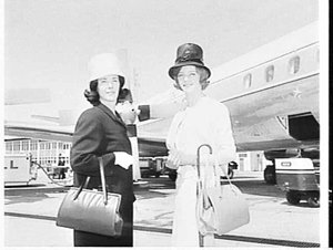 Miss Jacobs, Miss New Zealand, on the tarmac in front o...