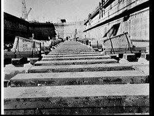 Laying concrete blocks for the keel of a RAN ship, Capt...