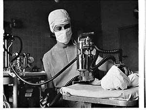 Anaesthetist with CIG equipment in the operating theatr...