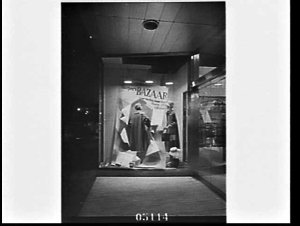 McDowell's autumn 1958 shop windows lit at night