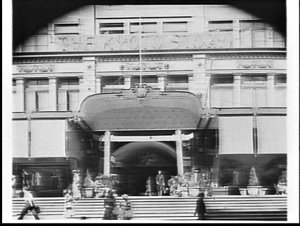 Terrace with Japanese style arch advertising Nitto Bose...