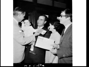 Presentation of Canadian Pacific air tickets to a famil...