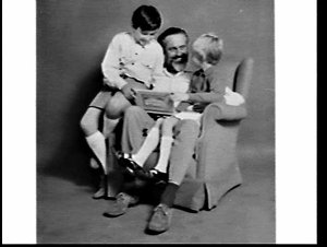 APA studio advertising photograph of "father" being giv...
