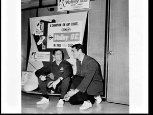 Two fencers of Australian Olympic Team in Dunlop sandshoes and Olympic uniforms