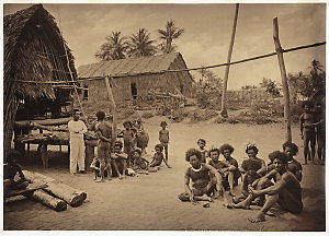 Item 6: Village scene at Kalo with teacher and Christia...