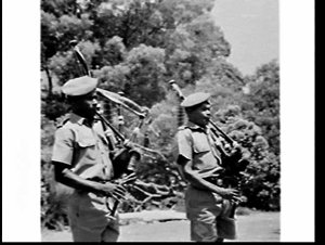 Papua New Guinea Army Pipe Band performs in the shoppin...