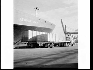 Unloading a telescope in crates at the Overseas Contain...