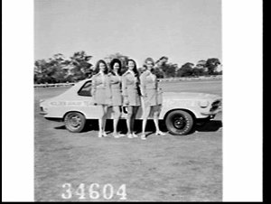 Women Holden dealers team (motor sport) pose with Colin...