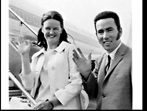 Mr. & Mrs. Colin Smith leave on a Pan Am flight for Hon...
