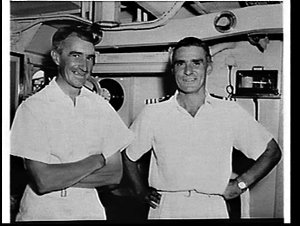 Commander E.T. Peel of HMAS Tobruk and Captain R. Rhoad...