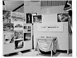 Lend lease display of photographs and a model of the ne...
