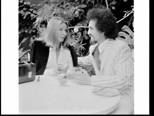 Babette Cashman and hairdresser at an open-air restaura...