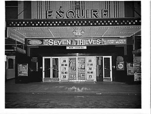 Exterior of Esquire Theatre, 1960, advertising the film...