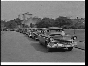 Hire cars lined up outside Government House on the occa...