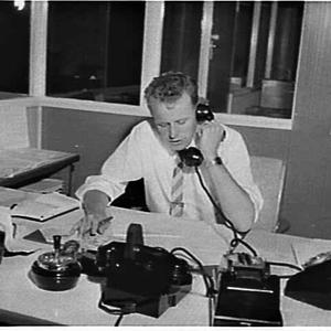 J. Fleming in his office at the warehouse, Self Service...