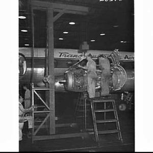 Changing a jet engine on a Trans-Australian Airlines' V...