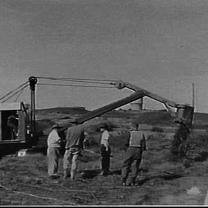 Steam shovel turns the first sod for 5 million pounds (...