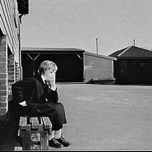Schoolgirl waits in the playground for the Salk polio v...