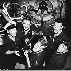 Sailors in the engine room of HMAS Anzac at sea en rout...