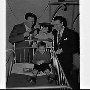 Tikki Taylor and Bill Newman visit a boy with polio at ...