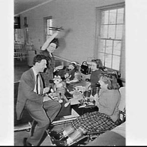 Desmond Tester and Ann entertain the children at the Ma...