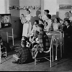Children watching television in a Mater Hospital ward