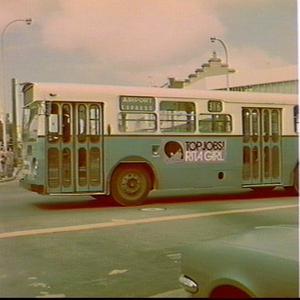 Bus with Alan Davis advertising sign for Rita Girl empl...