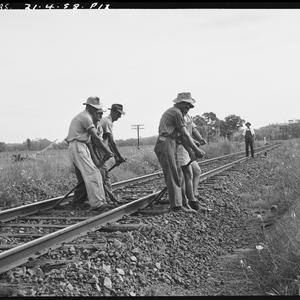 Fettlers, repair and maintenance work on a railway, Parkes, 21 April 1958 / photographs by Lynch