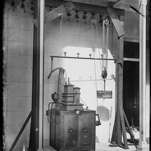 Servant bells and Lind acetylene gas making machine (?)...