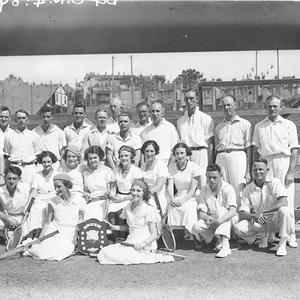 Group of men and women tennis players with shield, Whit...