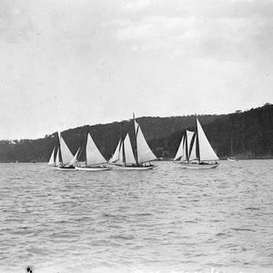 Two gaff-rigged, a ketch and a staysail schooner, in ma...