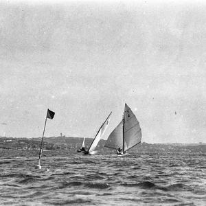 Two eighteen-footers, rounding the buoy at Watsons Bay