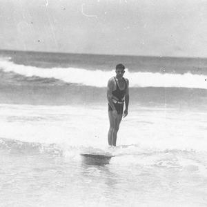 Surfboard riding by Ronnie Anderson on an old style nin...