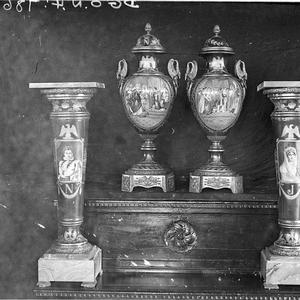 Two royal Sevres antique urns and their pedestals, orna...